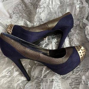 Jennifer Lopez 
Size 7.5 color Navy blue